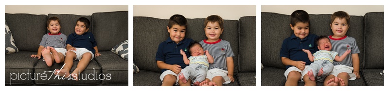 two brothers on couch with newborn brother