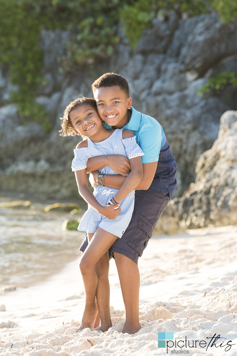 Family Beach Portraits in Grand Cayman with photographer Heather Holt Photography from Picture This Studios. 