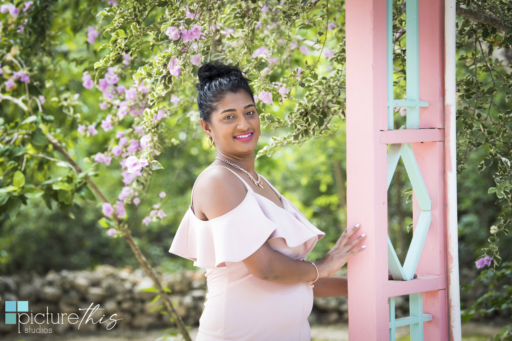 This beautiful little two year old celebrated with family portraits at The Cayman Islands Botanical Park by Heather Holt Photography with Picture This Studios