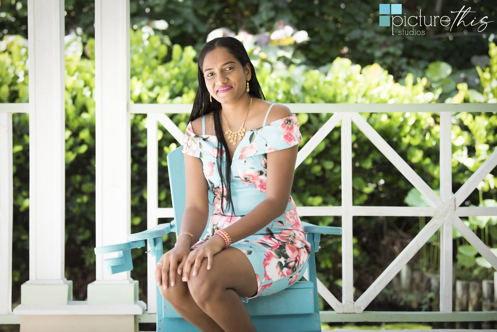 This beautiful little two year old celebrated with family portraits at The Cayman Islands Botanical Park by Heather Holt Photography with Picture This Studios