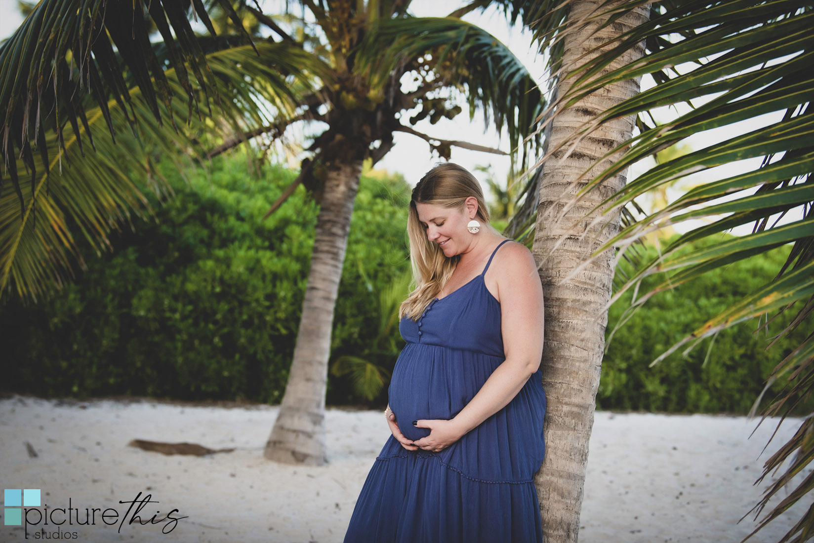 This beautiful couple did their pregnancy portraits in the paradise of Grand Cayman, Cayman Islands with Heather Holt Photography with Picture This Studios.